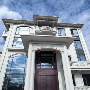 大庆白麻别墅外墙干挂石材效果示例