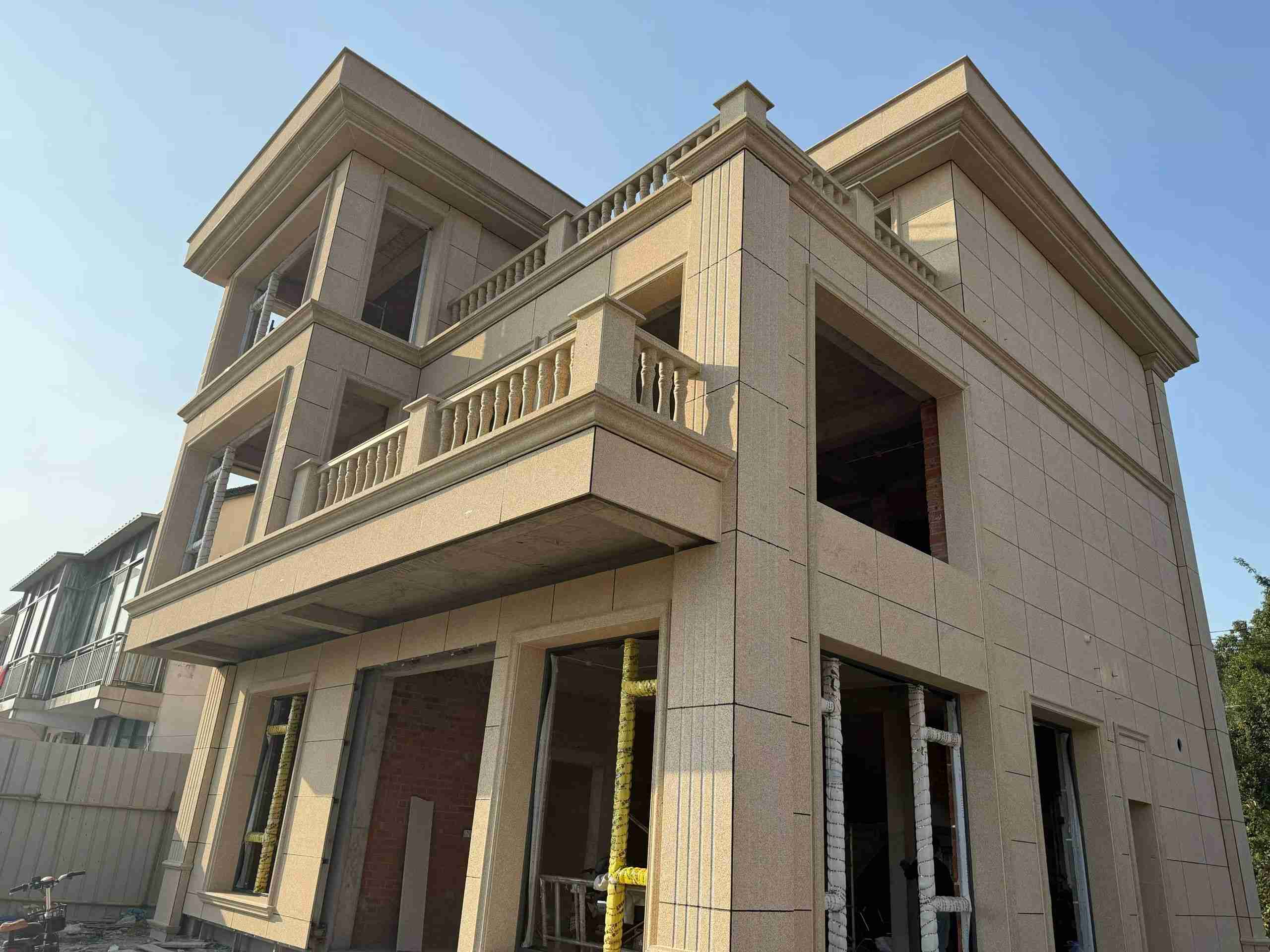 大庆 黄金麻花岗岩石材荔枝面外墙干挂效果展示