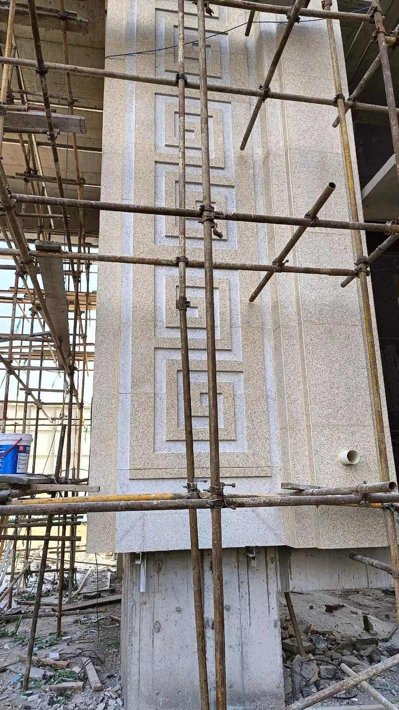 大庆 黄金麻花岗岩别墅外墙干挂回纹造型效果