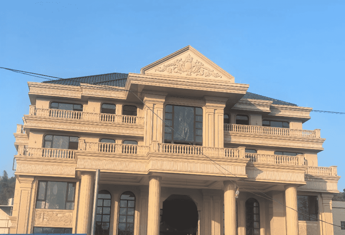 大庆黄金麻别墅外墙干挂石材效果示例